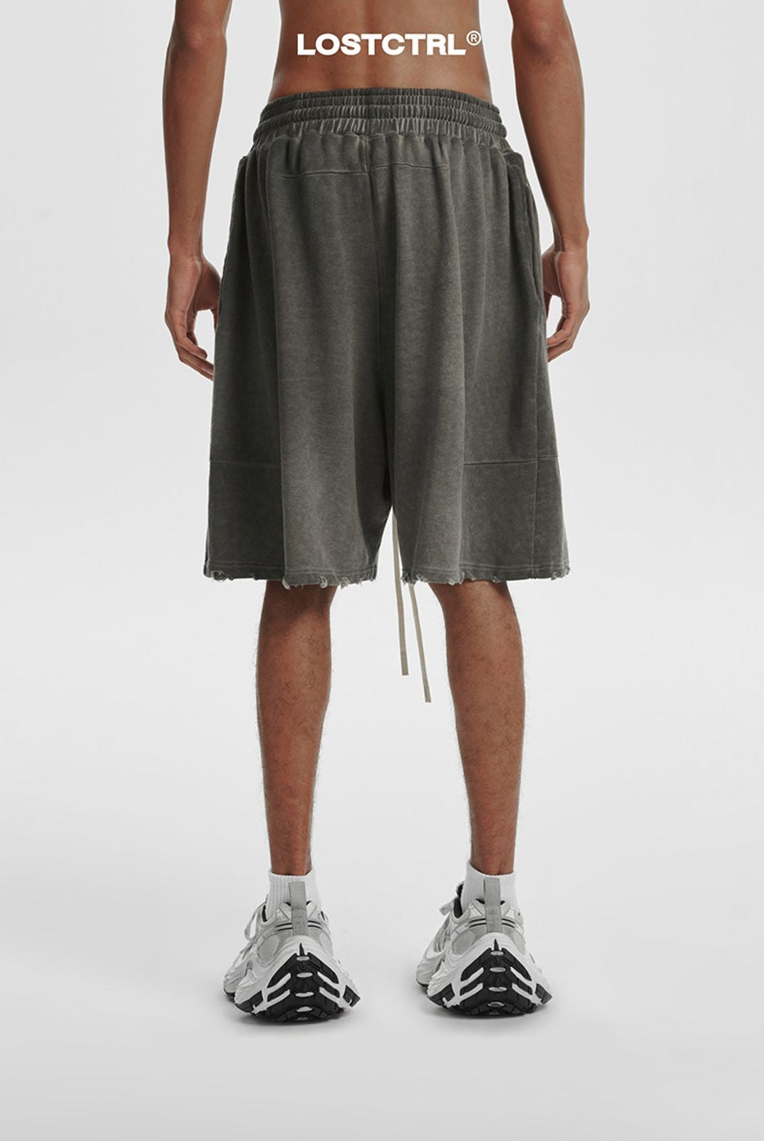 LOSTCTRL Washed Distressed Cotton Shorts in Gray - On Model