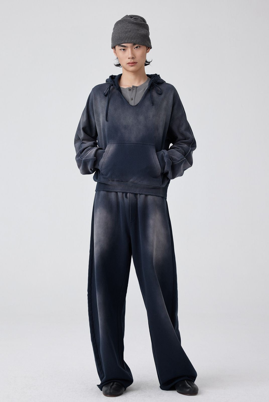 Simple Project Distressed Painted V Neck Hoodie in Navy - On Model