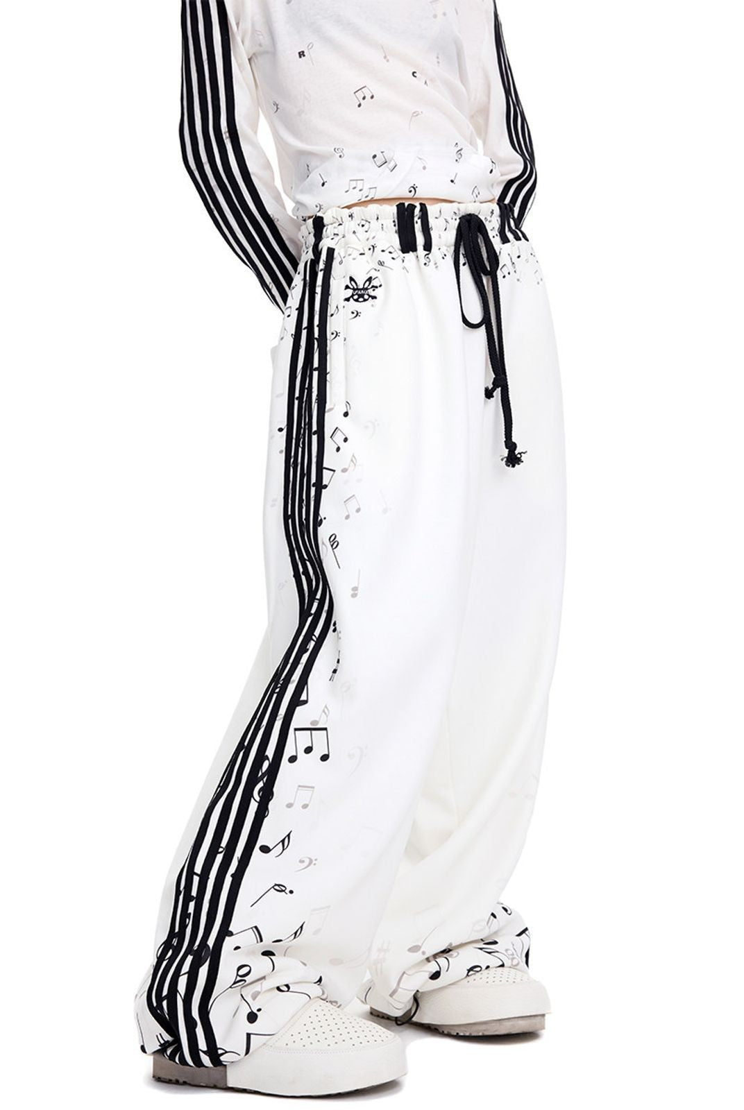CFIERCE Musical Staff Print Sweatpants in White - On Female Model