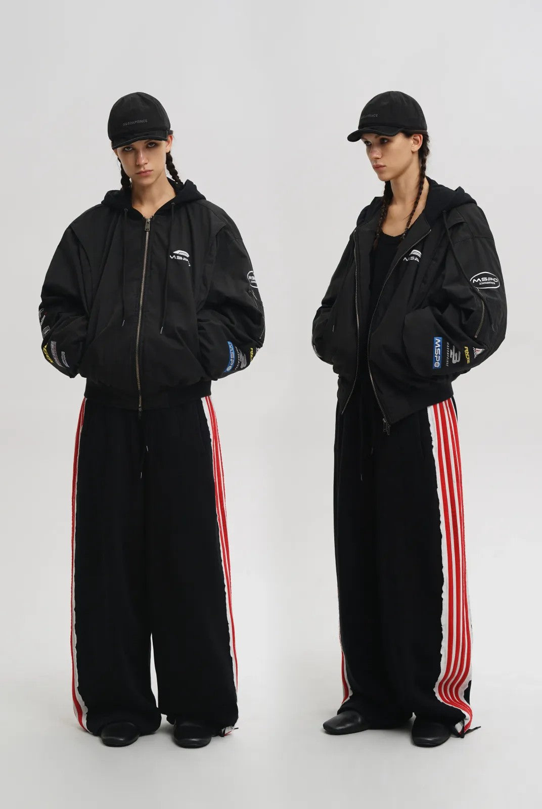 MASONPRINCE Hooded Racing Patch Puffer Jacket in Black - On Model