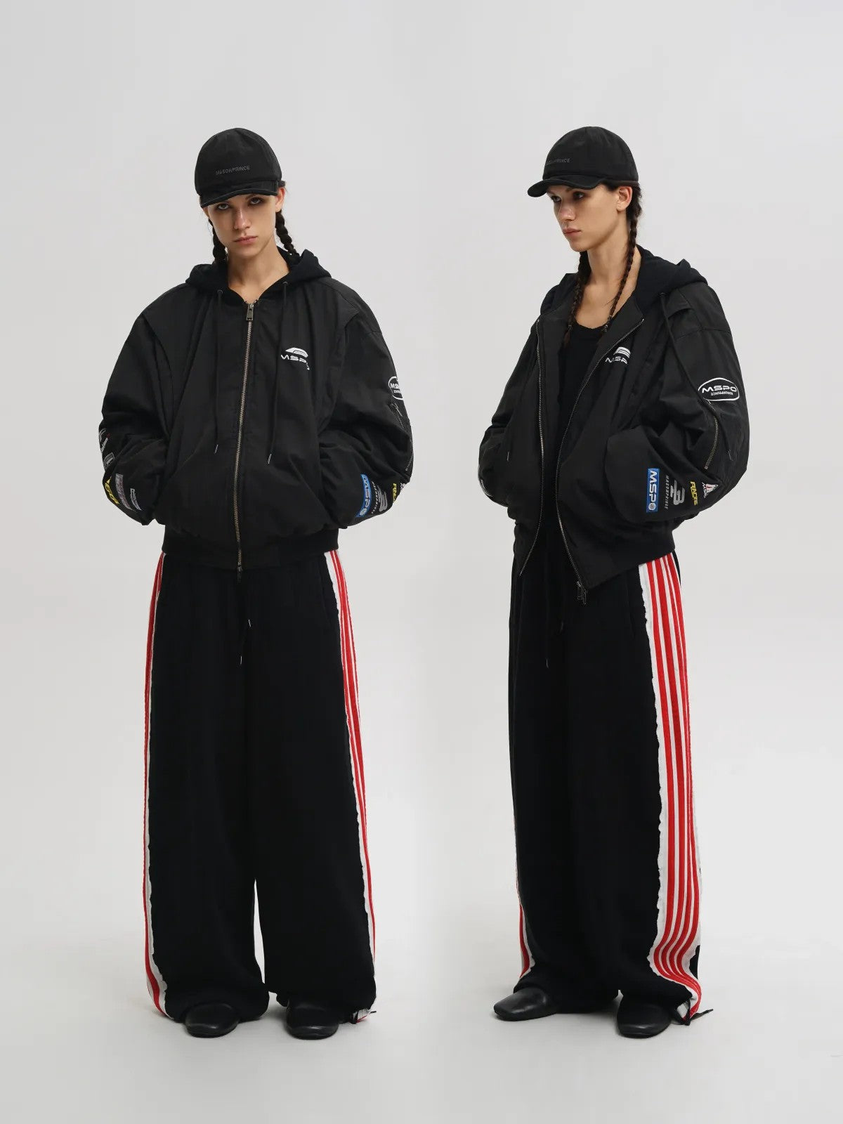 MASONPRINCE Hooded Racing Patch Puffer Jacket in Black - On Model