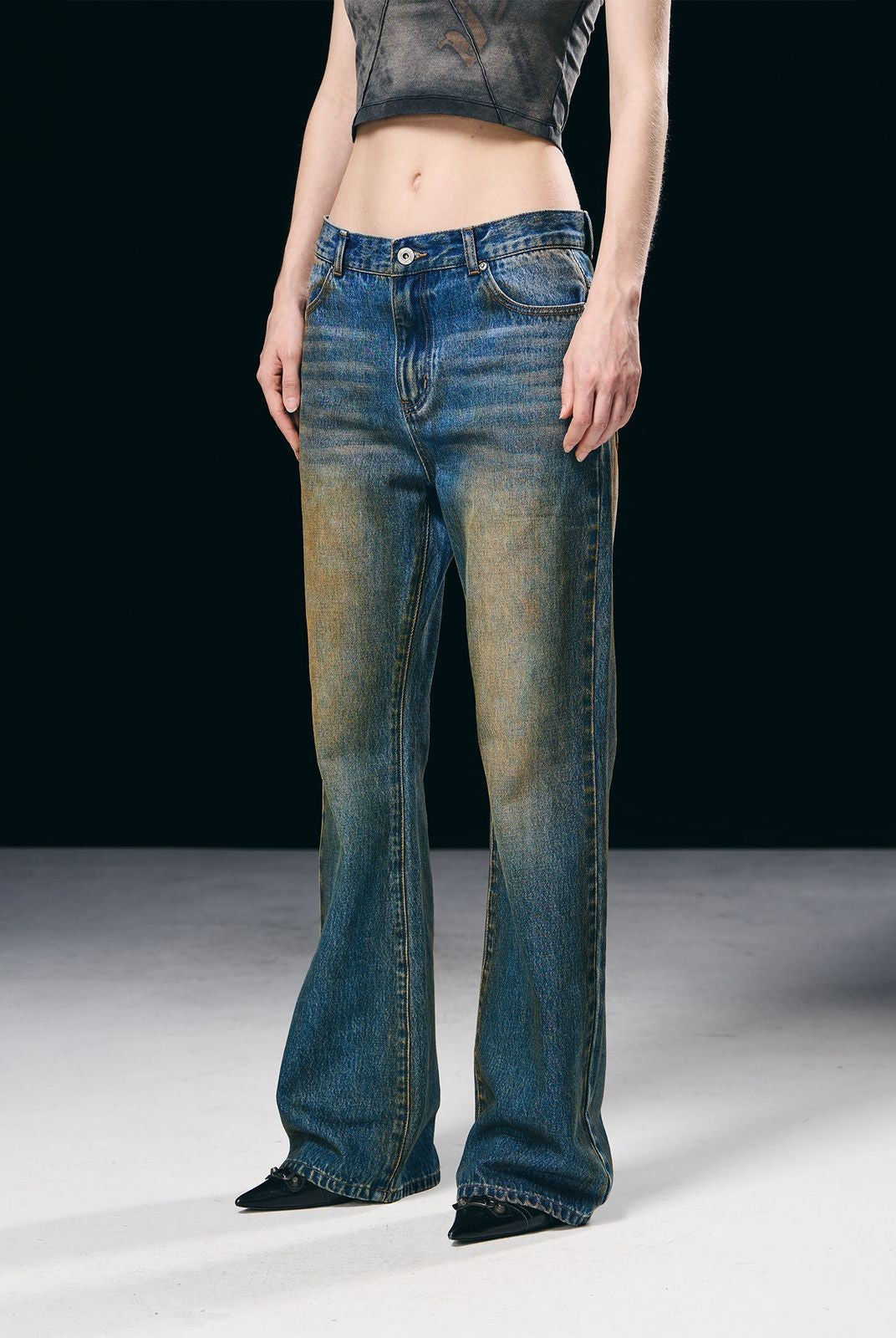 BLINDNOPLAN Mud Washed Distressed Micro Flare Jeans in Blue - On Model