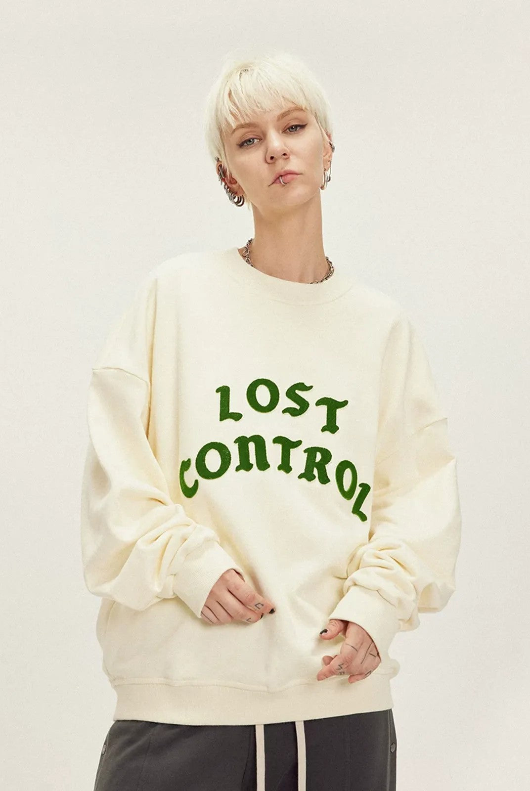 LOSTCTRL Chenille Logo Crewneck Sweatshirt in Cream - On Model