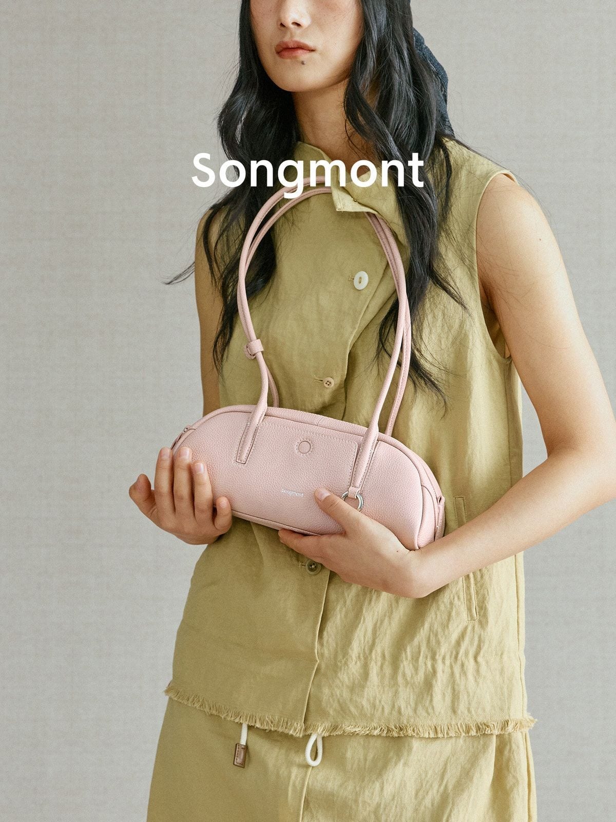 Songmont Mini Leather Bowling Bag in Pink - On Model
