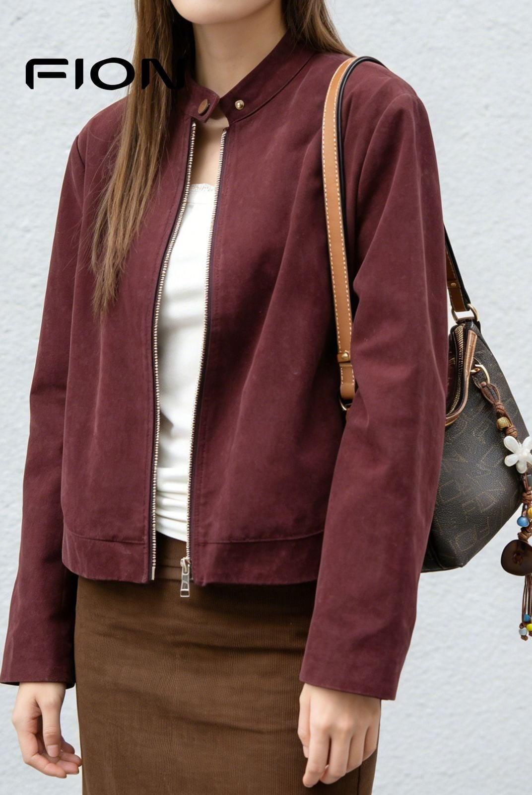 FION Monogram Coated Canvas Hobo Bag in Brown - On Female Model