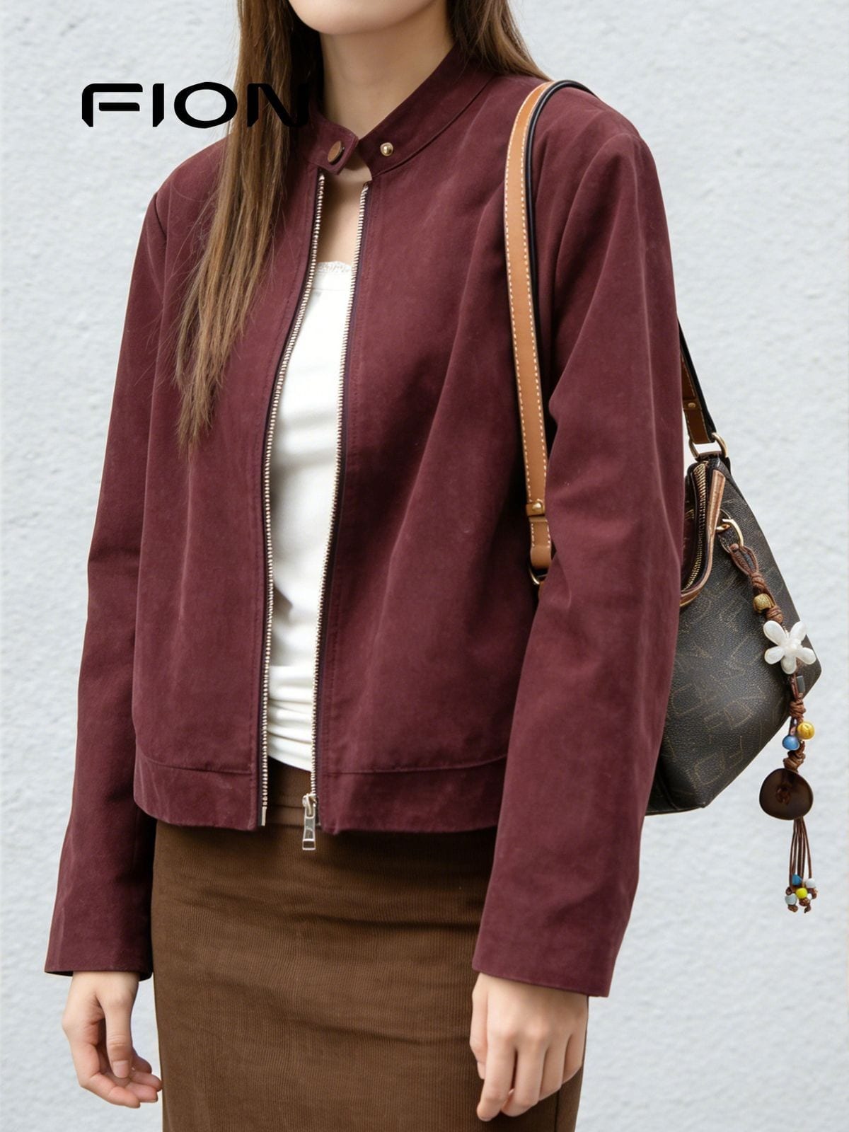 FION Monogram Coated Canvas Hobo Bag in Brown - On Female Model