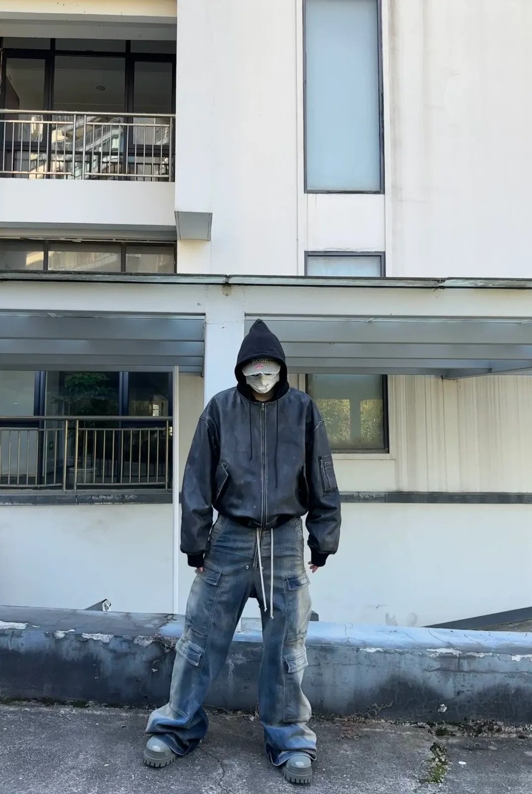 UNKNOWNWORLD Distressed Cowhide Hooded Bomber in Black - On Model