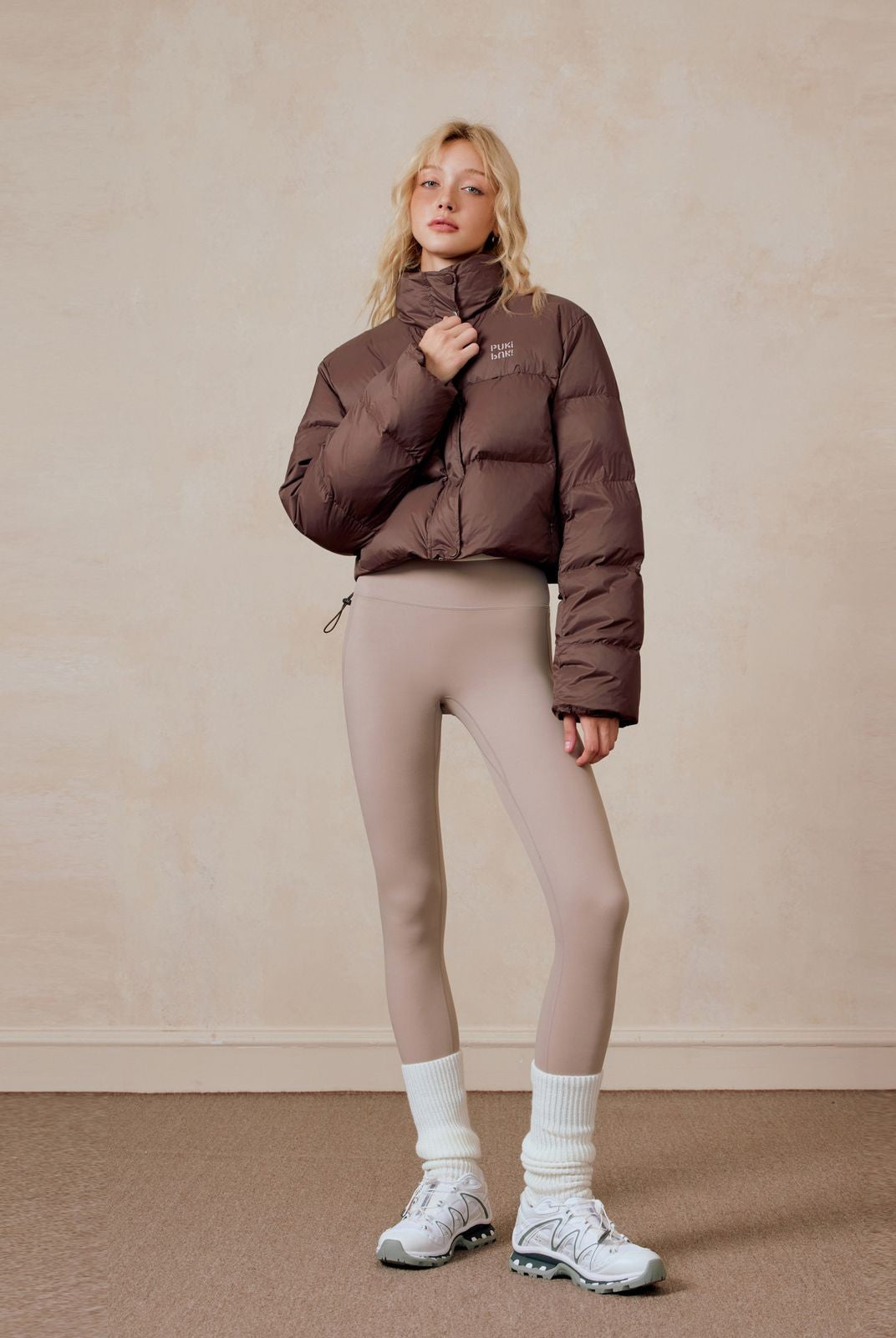PUKI Cropped White Duck Down Puffer in Brown - On Model