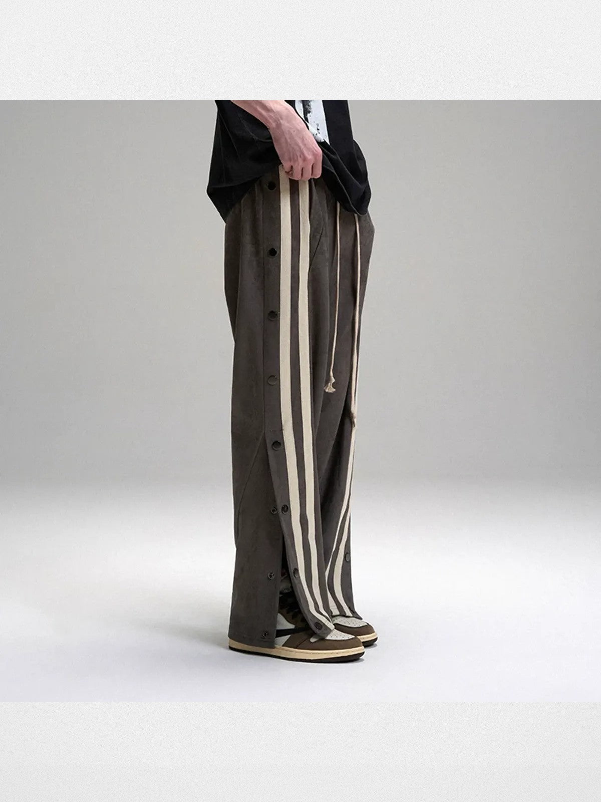 LOSTCTRL Side Snap Suede Track Pants in Beige - On Model