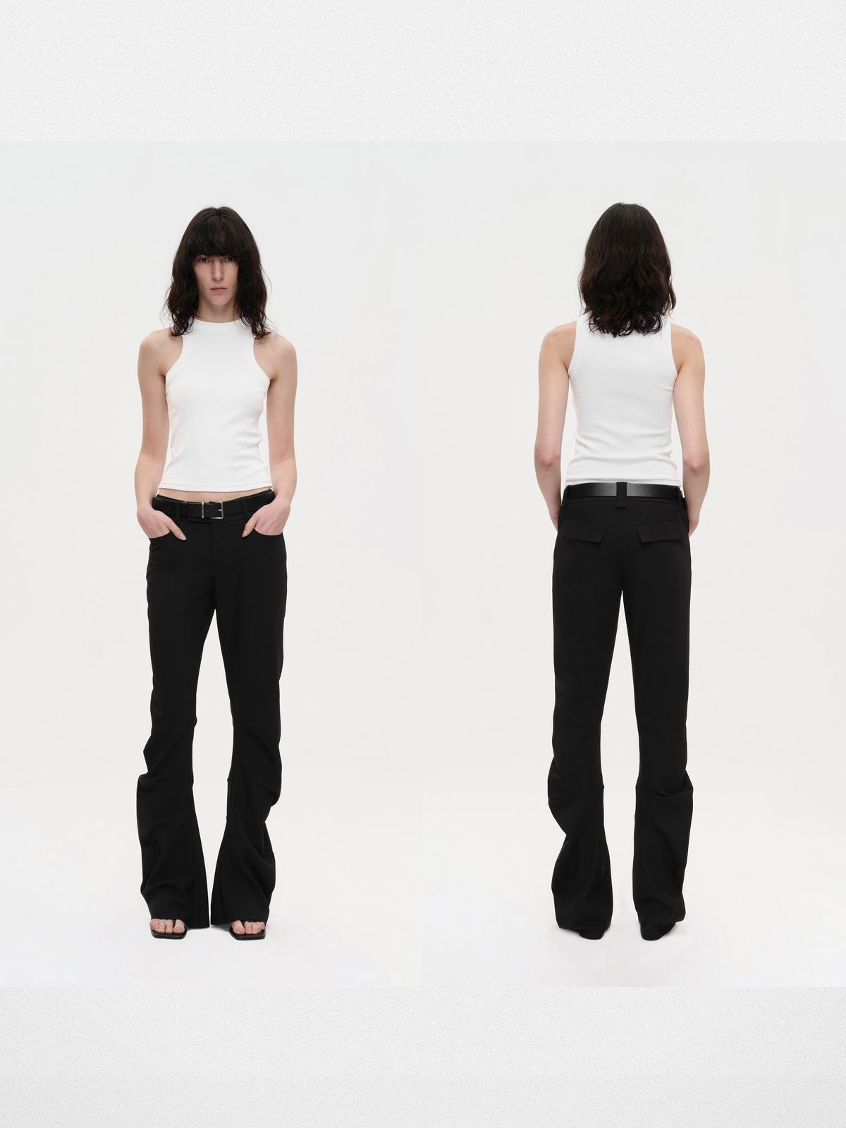 RARELY ALIKE Curved Leg Flared Suit Pants in Black - On Model