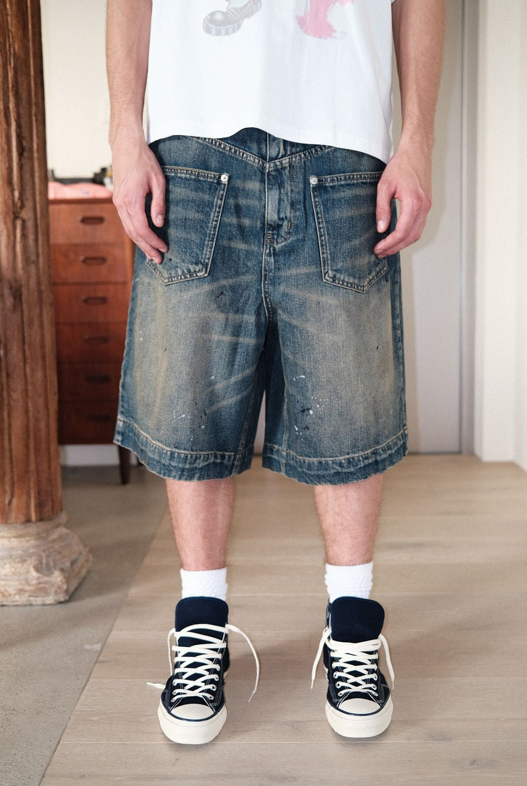 UNKNOWNWORLD Mud Dye Reverse Pocket Shorts in Yellow - On Model