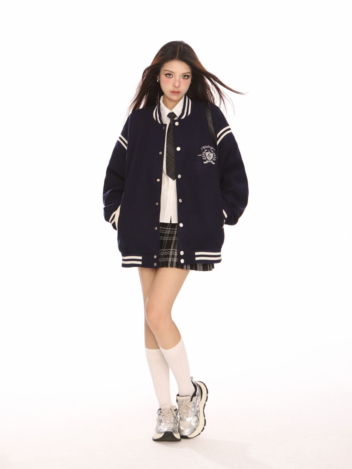BIGGOLD STUDIO Retro Stand Collar Varsity Jacket in Navy Blue - On Model #color_navy-blue