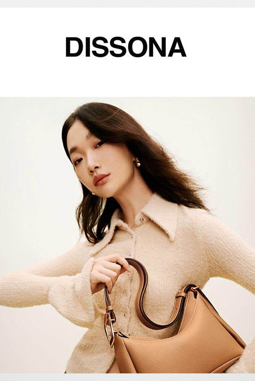 DISSONA Cowhide Leather Shoulder Bag in Brown - On Female Model