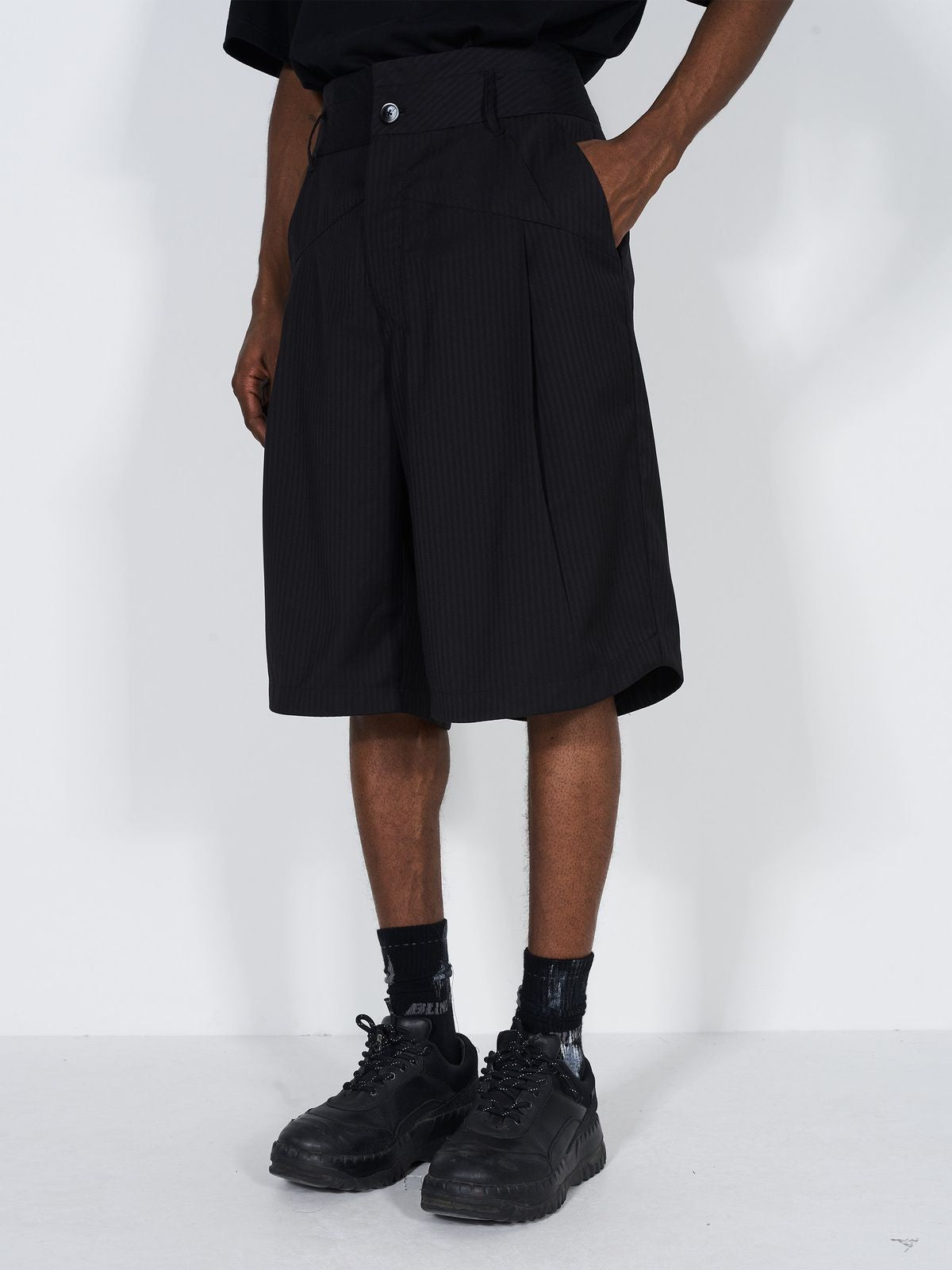 BLINDNOPLAN Dislocated Stripe Tailored Shorts in Black - On Model