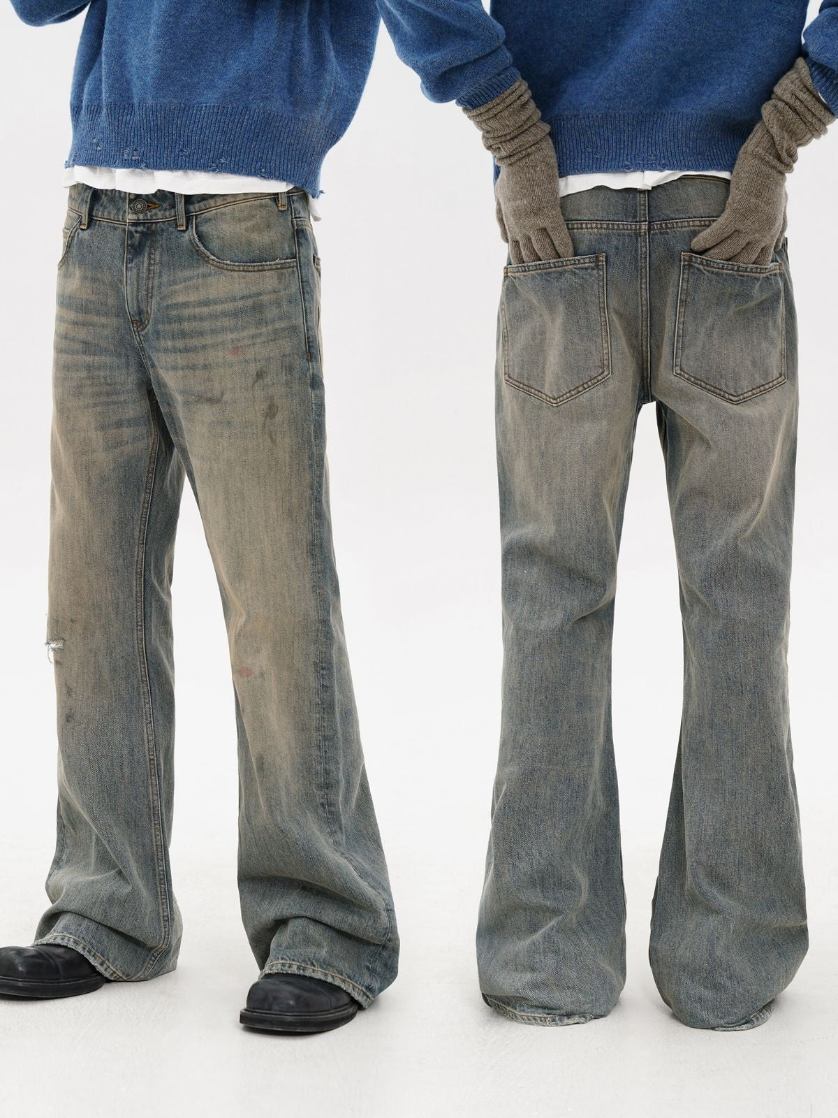 MASONPRINCE Distressed Boot Cut Washed Jeans in Blue - On Model #color_blue