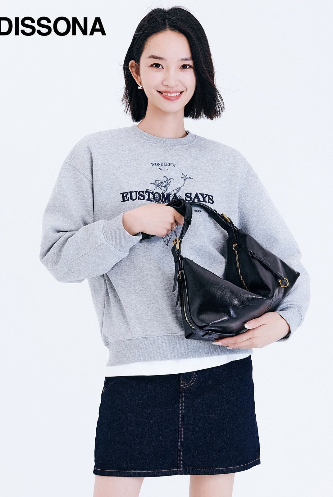 DISSONA Distressed Leather Crescent Hobo Bag in Black - On Female Model