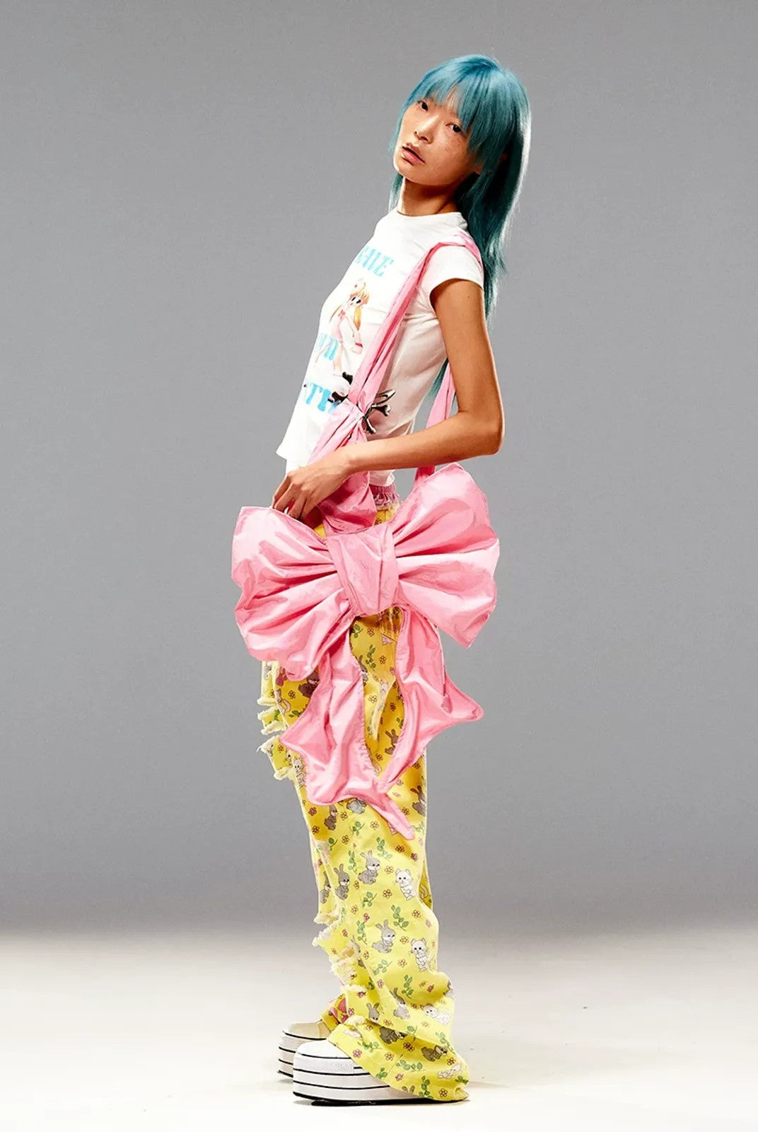 CFIERCE Nylon Bow Crossbody Bag in Pink - On Model