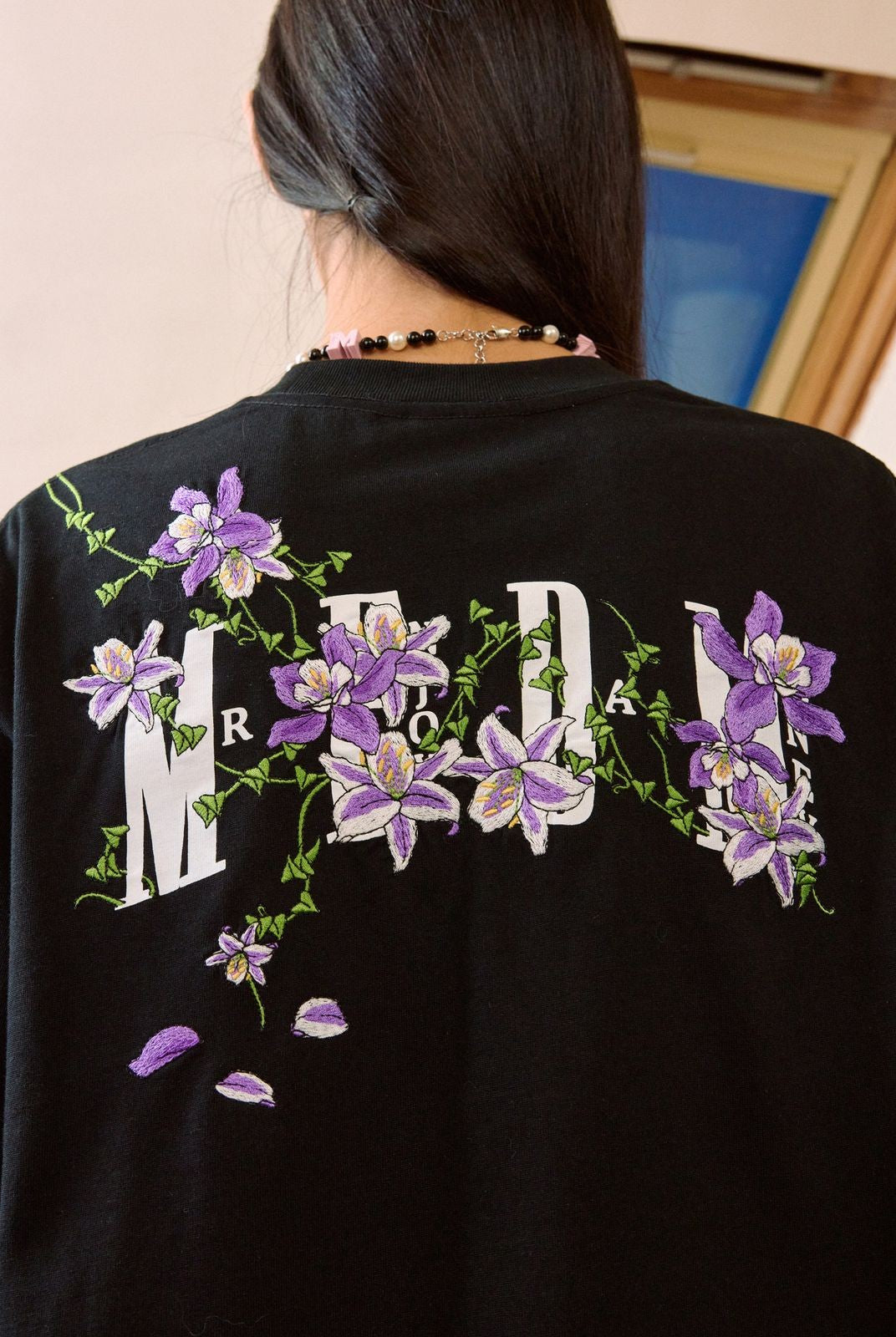 MEDM Vine Floral Embroidery T Shirt in Black - On Female Model