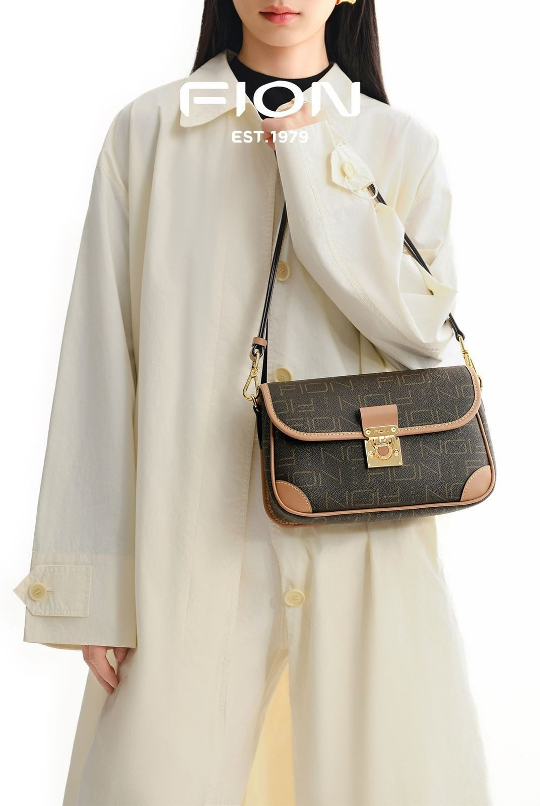 FION Monogram Faux Leather Baguette Bag in Brown - On Female Model