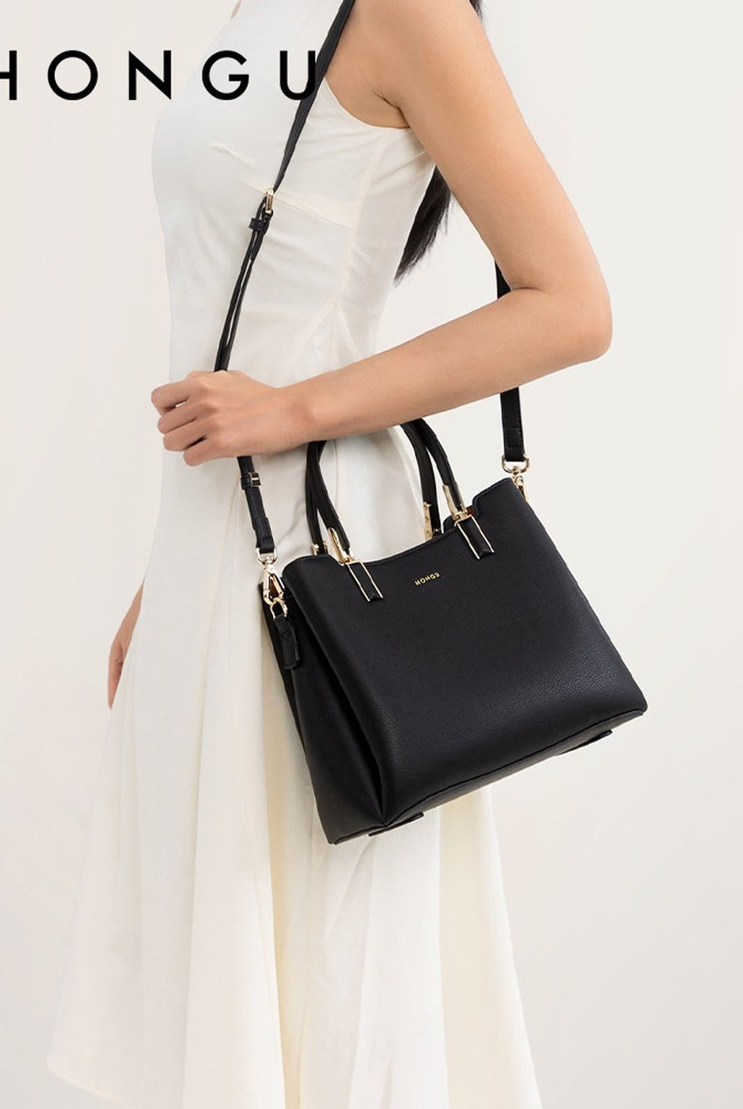 HONGU Structured Split Leather Handbag in Black - On Female Model