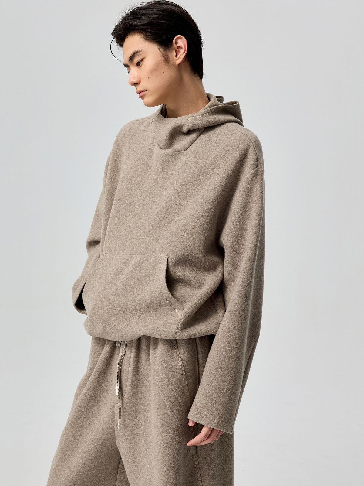 Simple Project Drawstring Hem Fleece Hoodie in Beige - On Model
