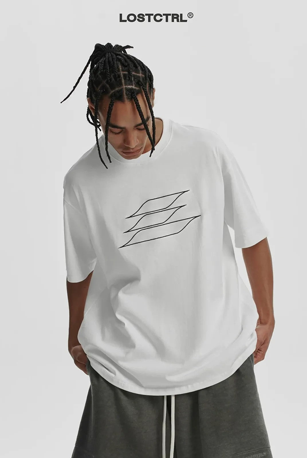 LOSTCTRL Outline Embroidered Logo T Shirt in White - On Model