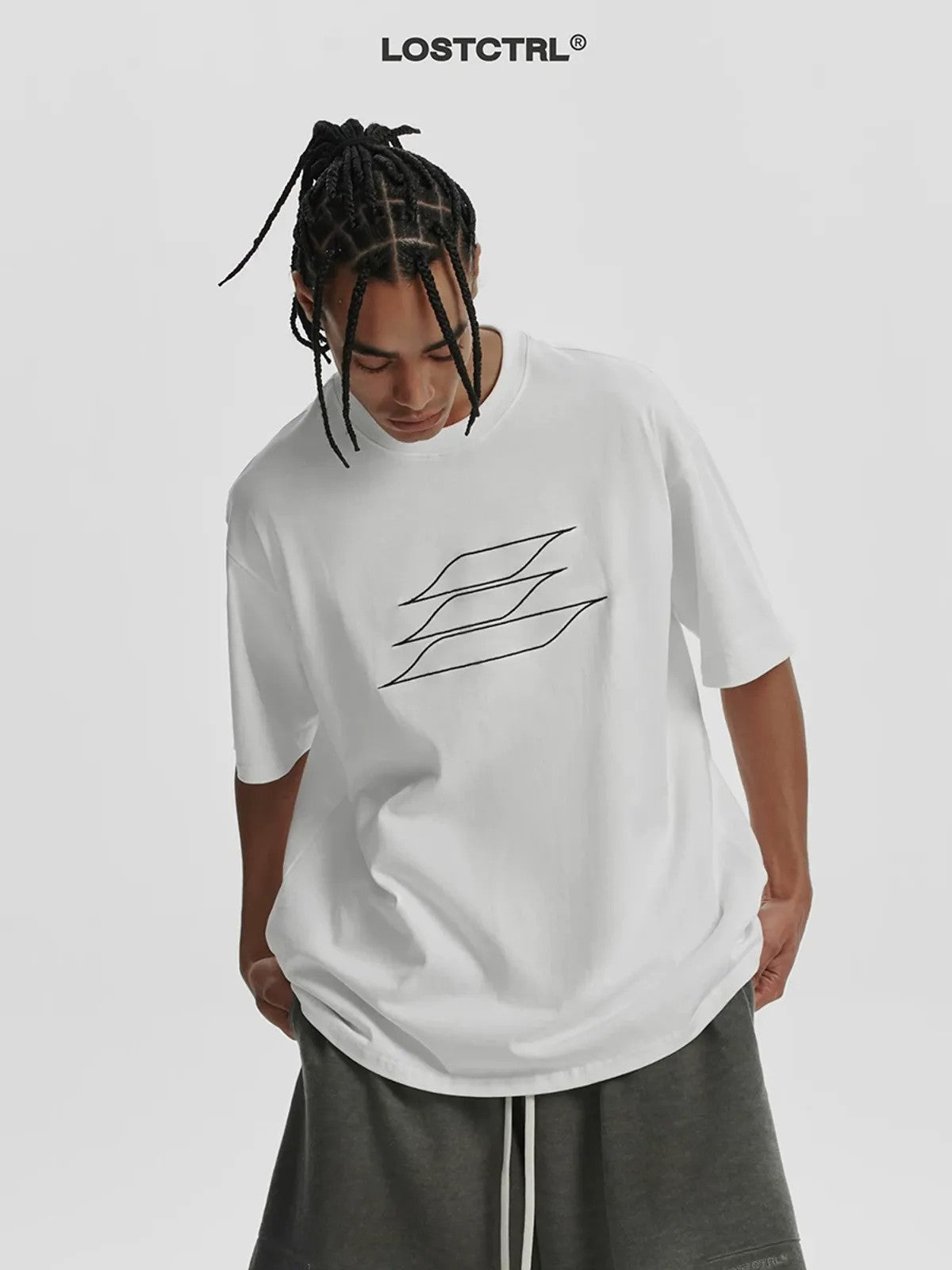 LOSTCTRL Outline Embroidered Logo T Shirt in White - On Model