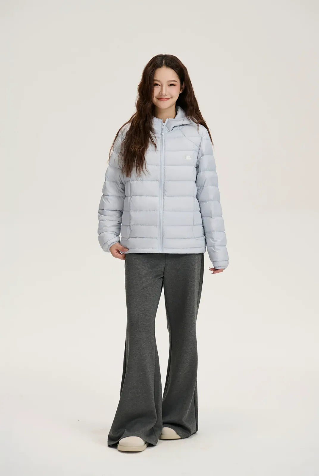 LOSTCTRL Hooded 90 Duck Down Puffer in Blue - On Model