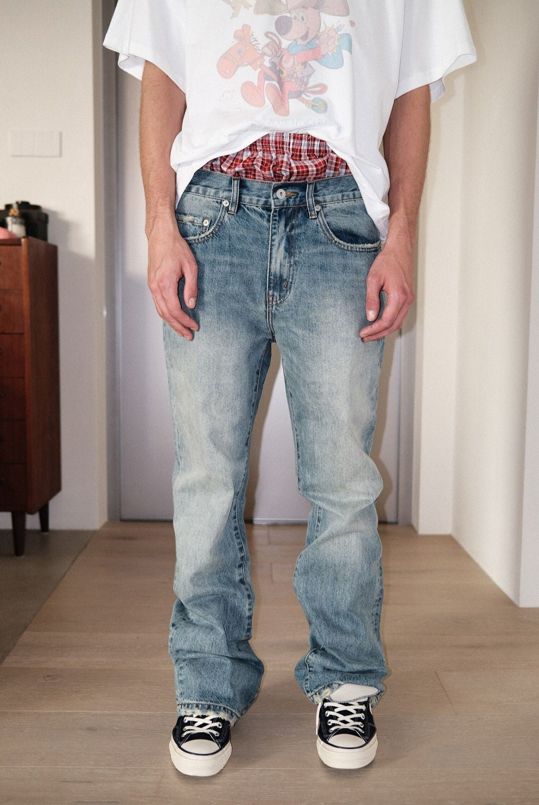 UNKNOWNWORLD Ice Blue Washed Micro Flare Jeans in Blue - On Model