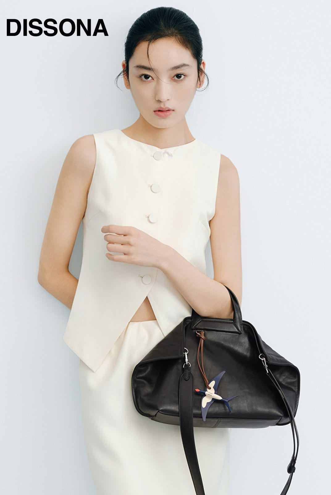 DISSONA Vegetable Tanned Leather Folded Tote in Black - On Female Model