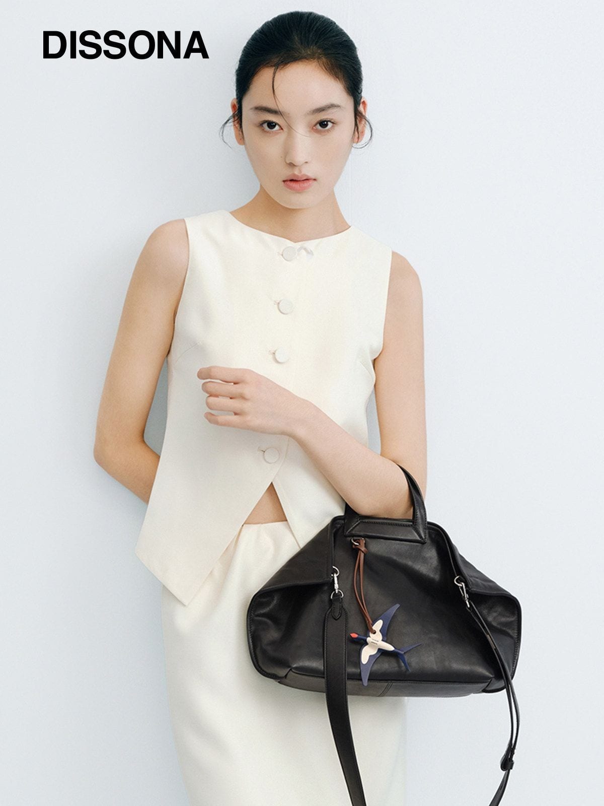 DISSONA Vegetable Tanned Leather Folded Tote in Black - On Female Model