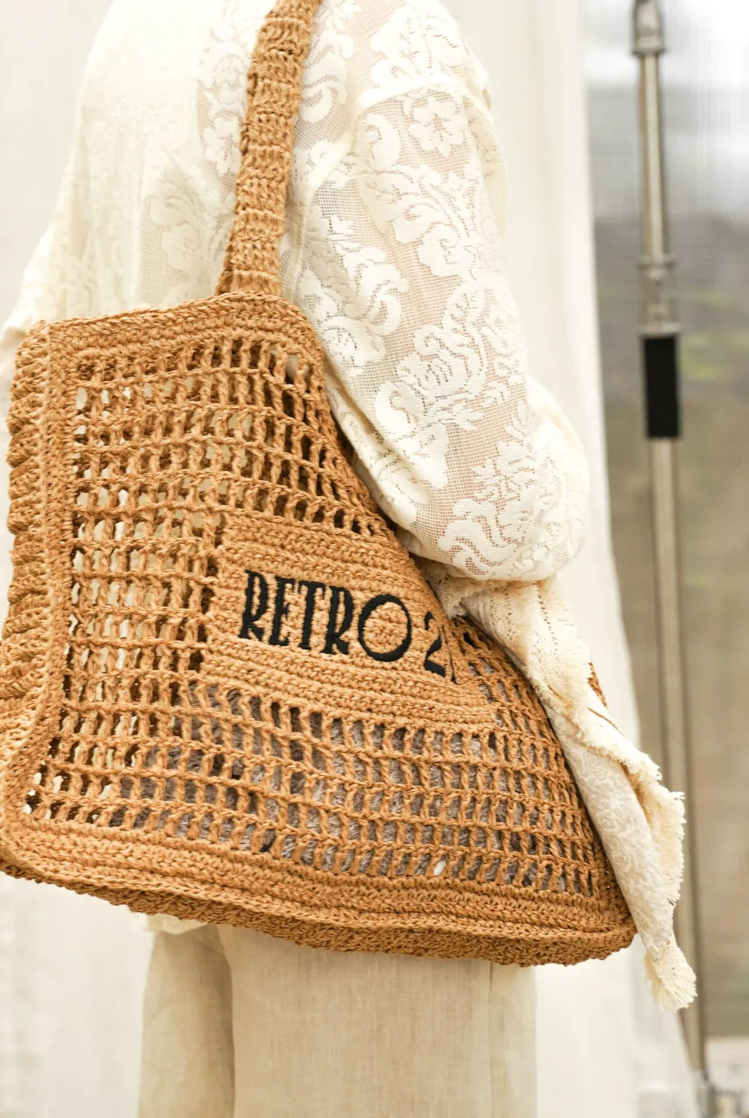 Retro 21 Handmade Raffia Cutout Tote Bag in Khaki - On Model