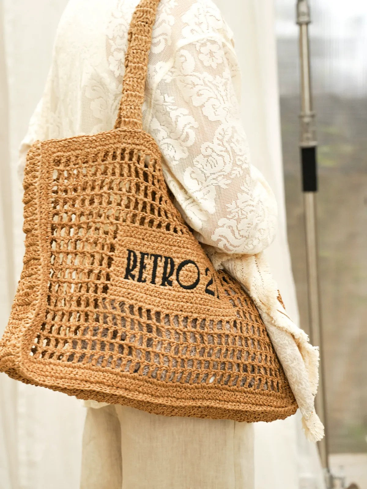 Retro 21 Handmade Raffia Cutout Tote Bag in Khaki - On Female Model