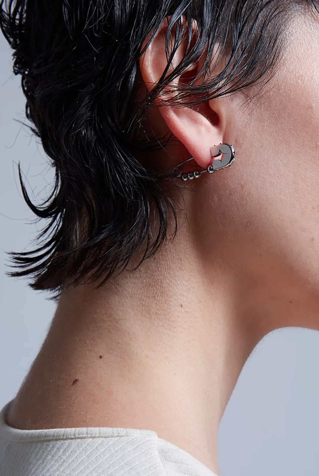 BLACKHEAD Rivet Ball Safety Pin Earrings in Silver - On Model