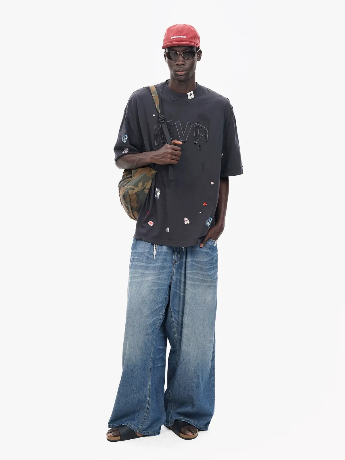 MASONPRINCE Distressed MVP Graphic T Shirt in Black - On Model