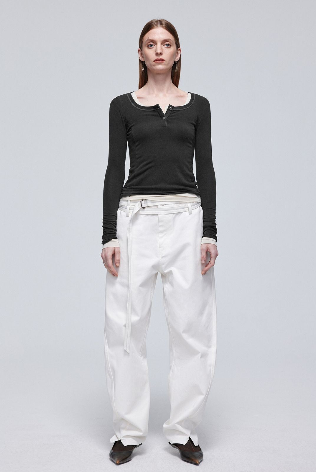 Simple Project Twisted Belt Curved Leg Pants in White - On Female Model