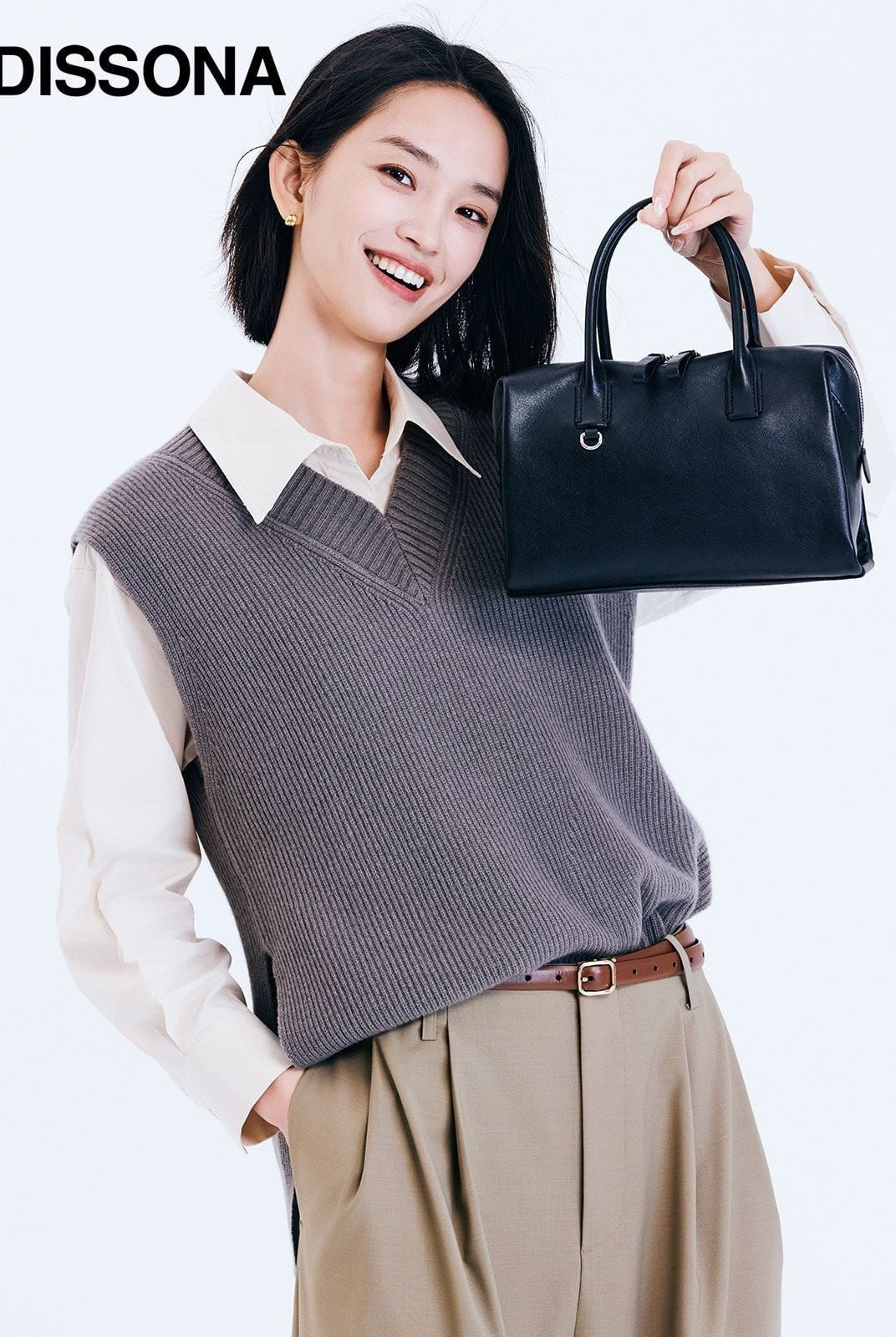 DISSONA Leather Top Handle Boston Bag in Black - On Female Model