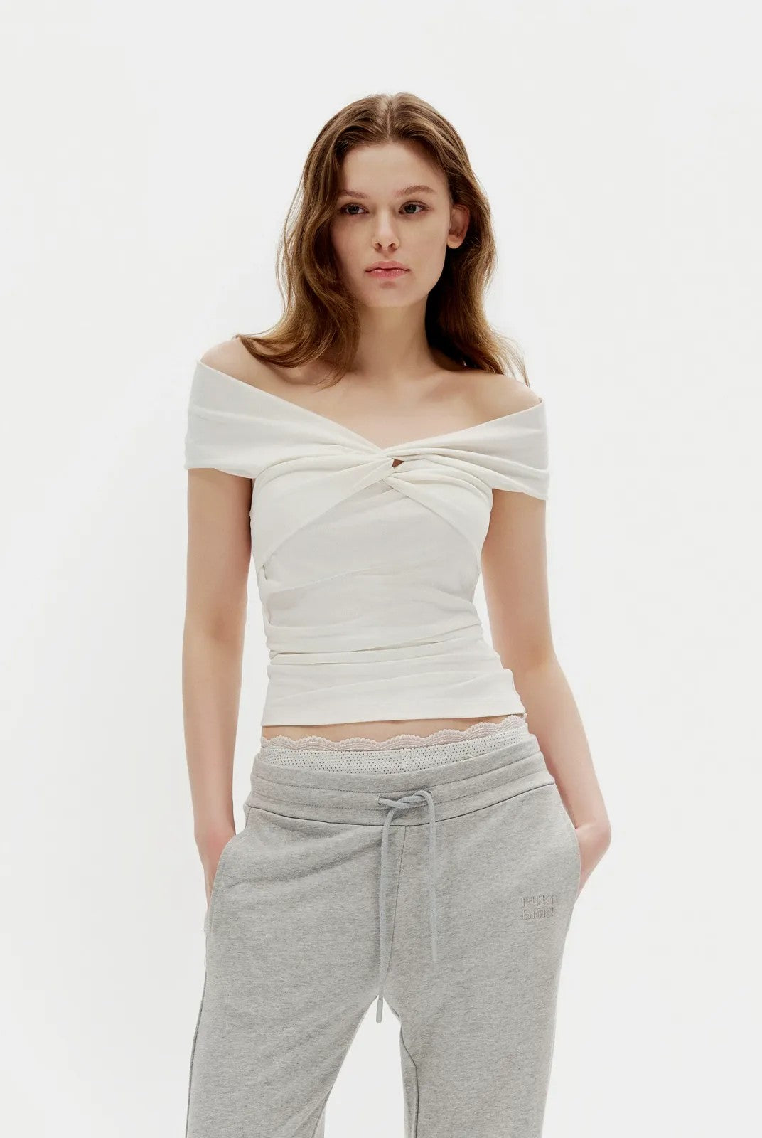 PUKI Twisted Knot Off Shoulder Top in White - On Model