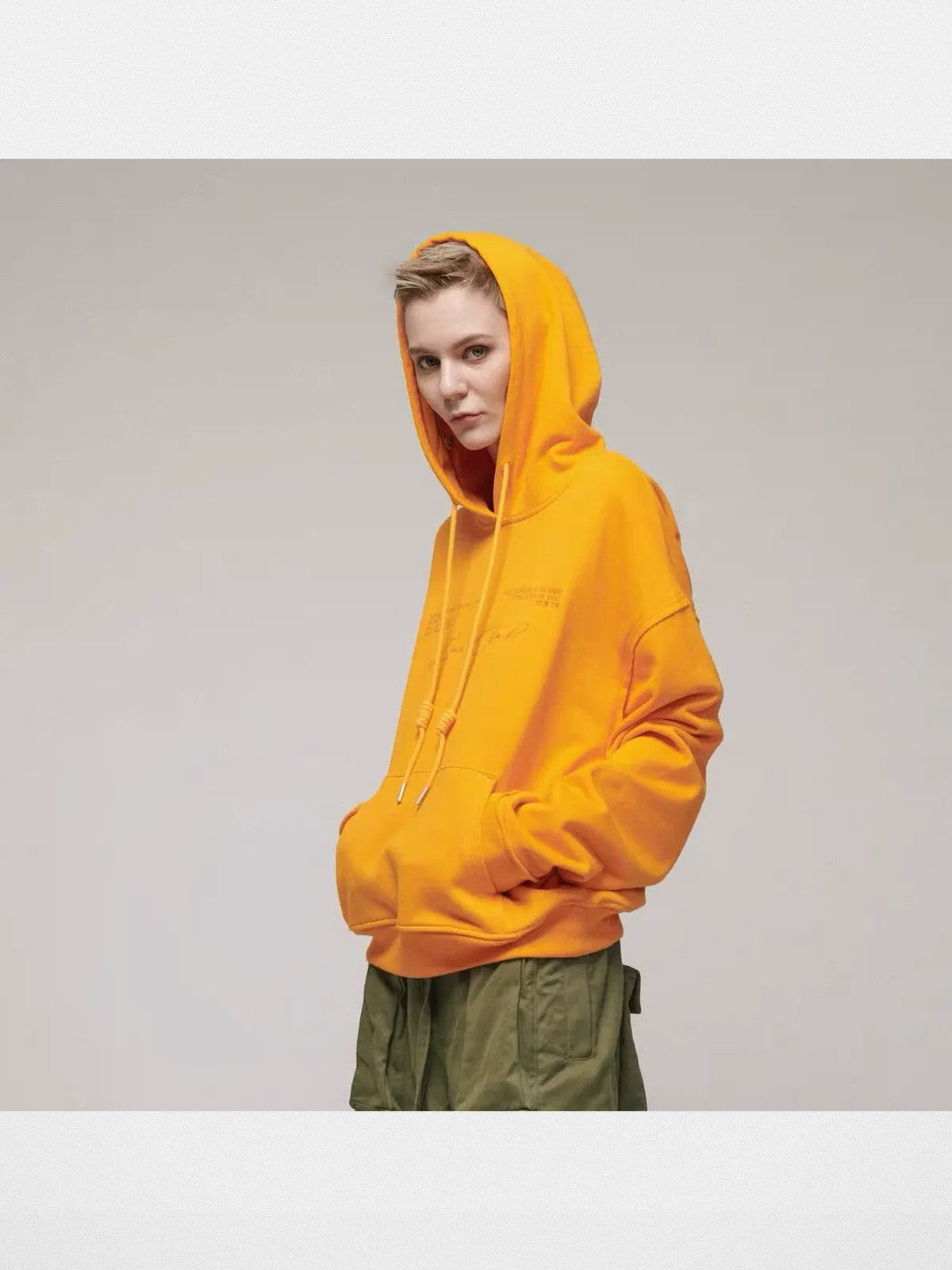 LOSTCTRL Embroidered Raw Edge Cotton Hoodie in Orange - On Model