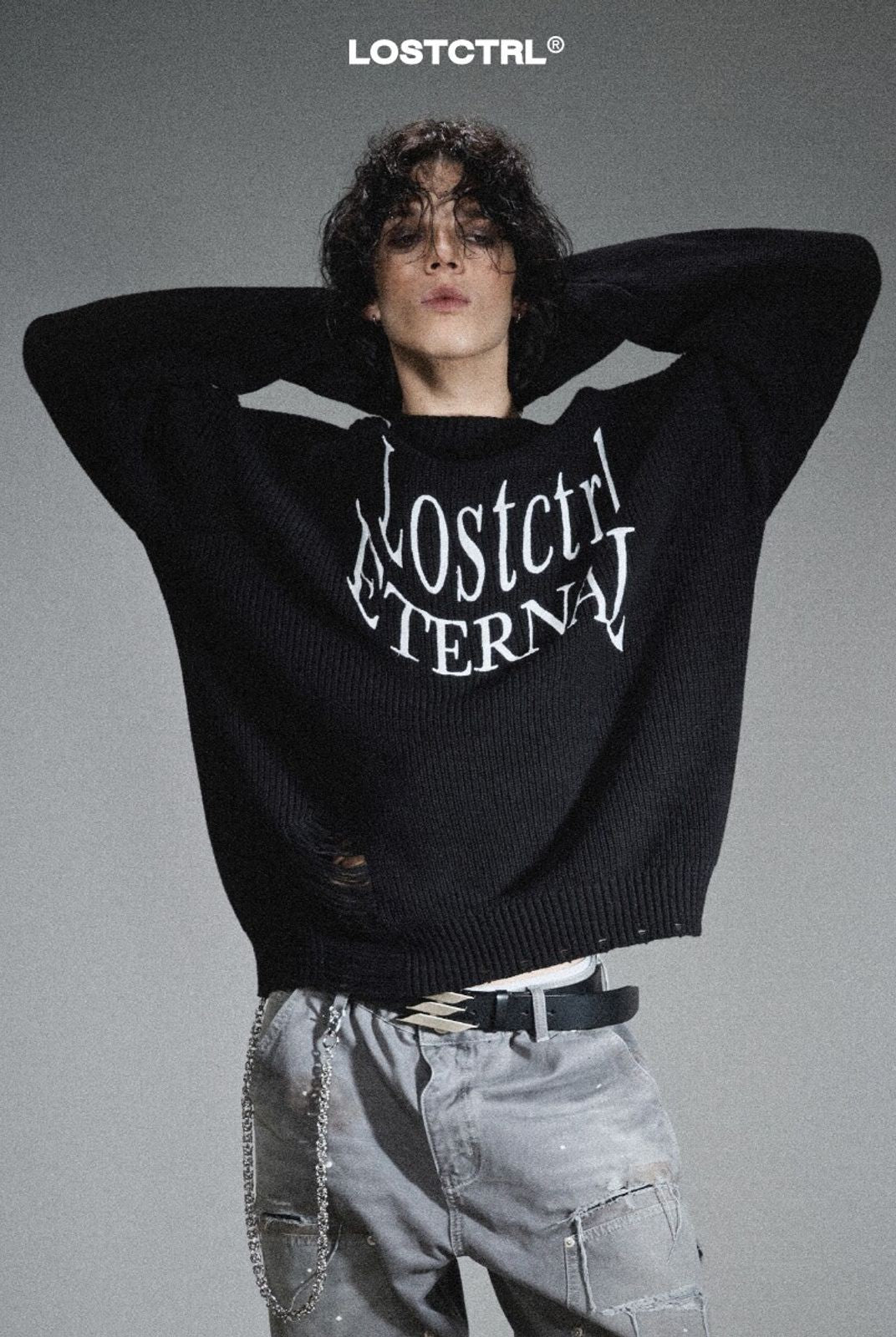 LOSTCTRL Distressed Logo Cotton Sweater in Black - On Model