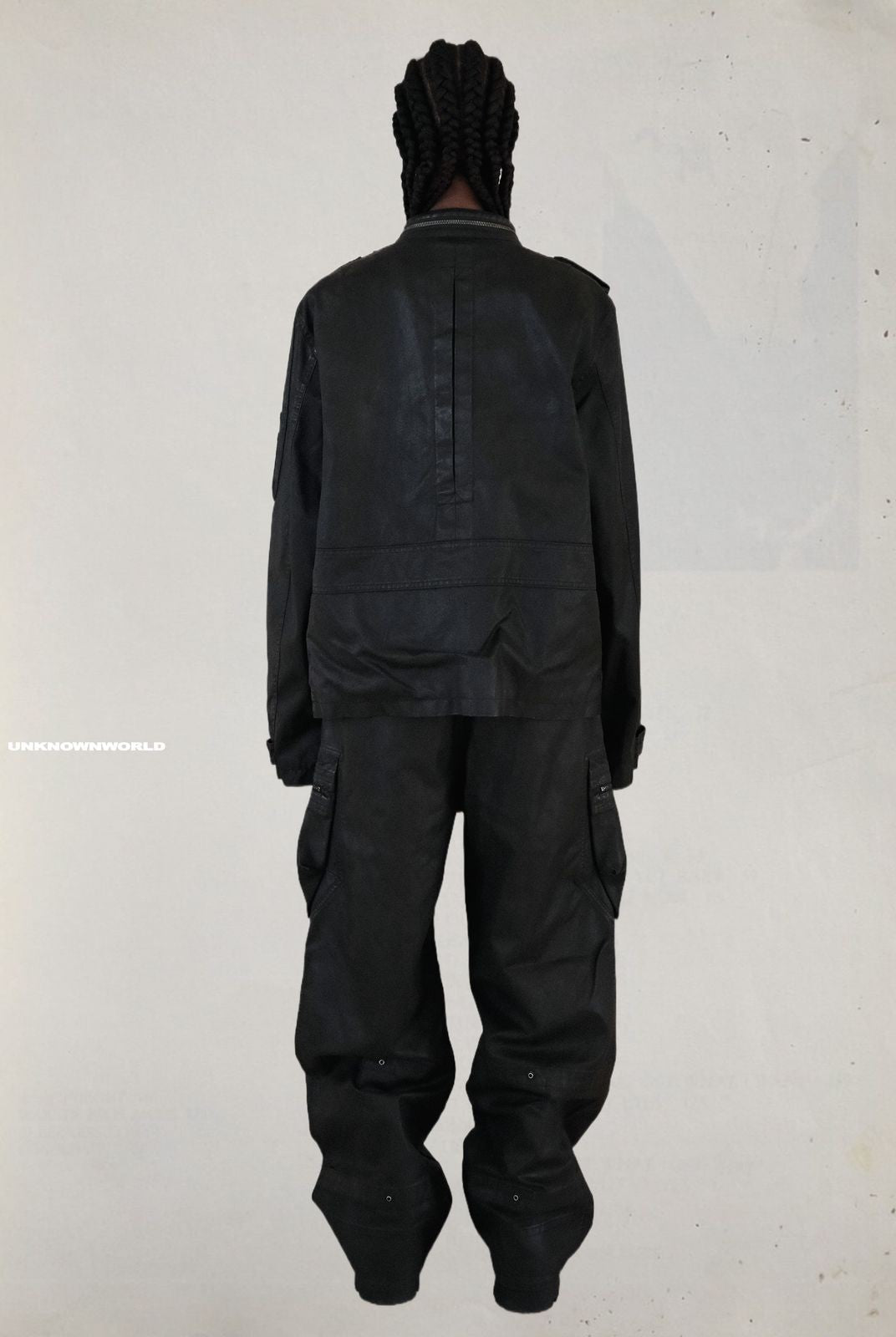 UNKNOWNWORLD Waxed Deconstructed M65 Jacket in Black - On Model