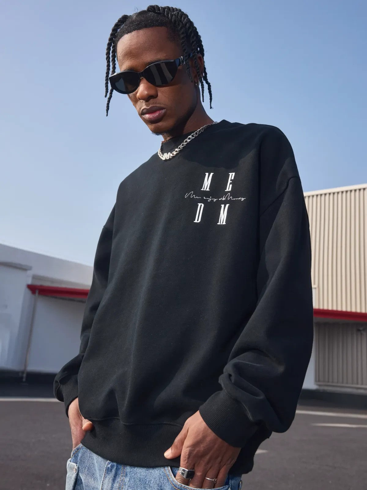 MEDM Oversized Logo Crewneck Sweatshirt in Black