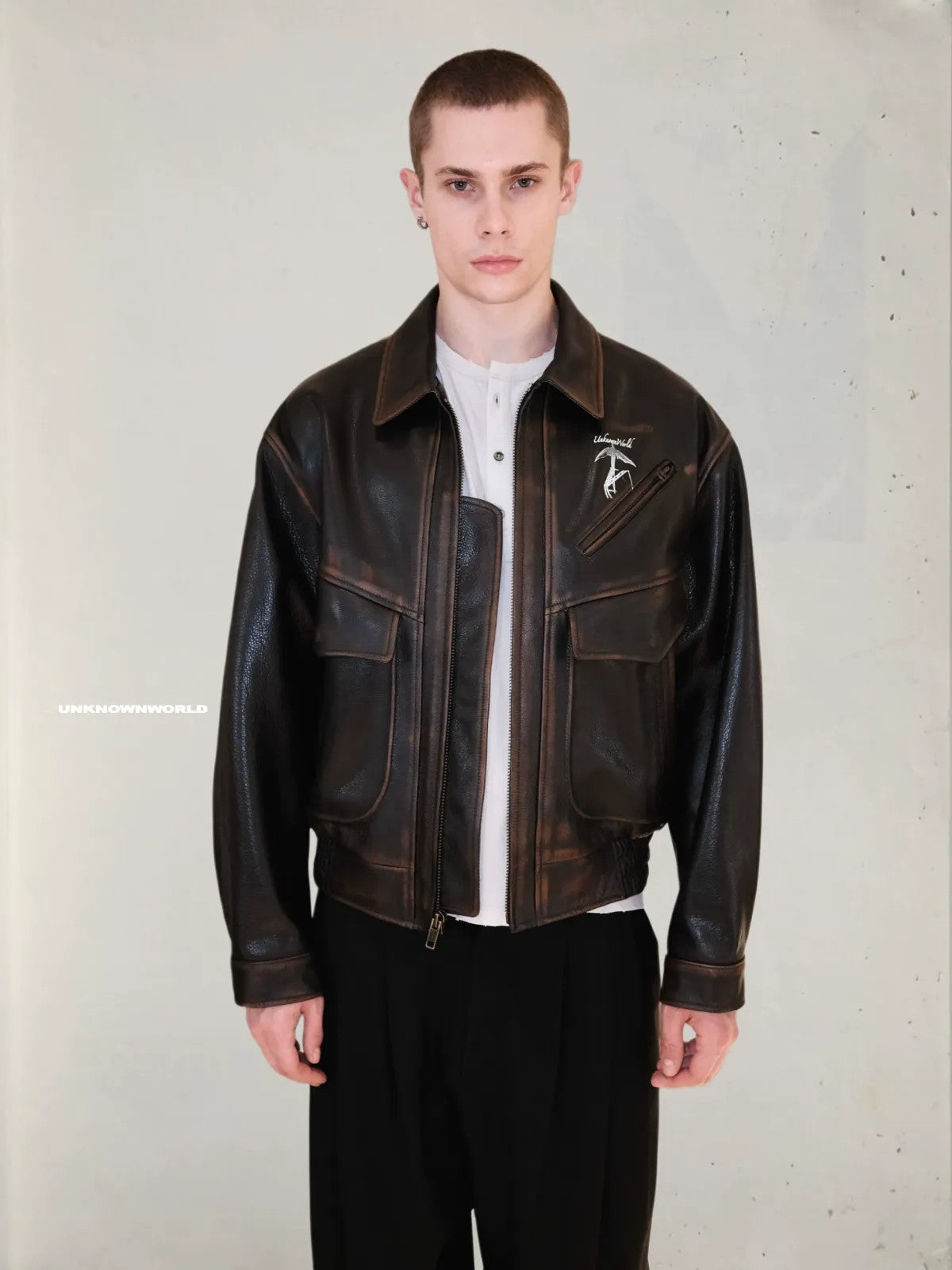 UNKNOWNWORLD Distressed Cowhide Flight Jacket in Brown - On Model
