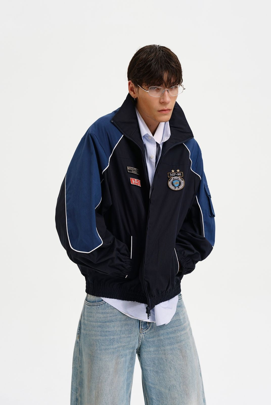 MASONPRINCE Color Blocked Badge Track Jacket in Blue - On Model #color_blue