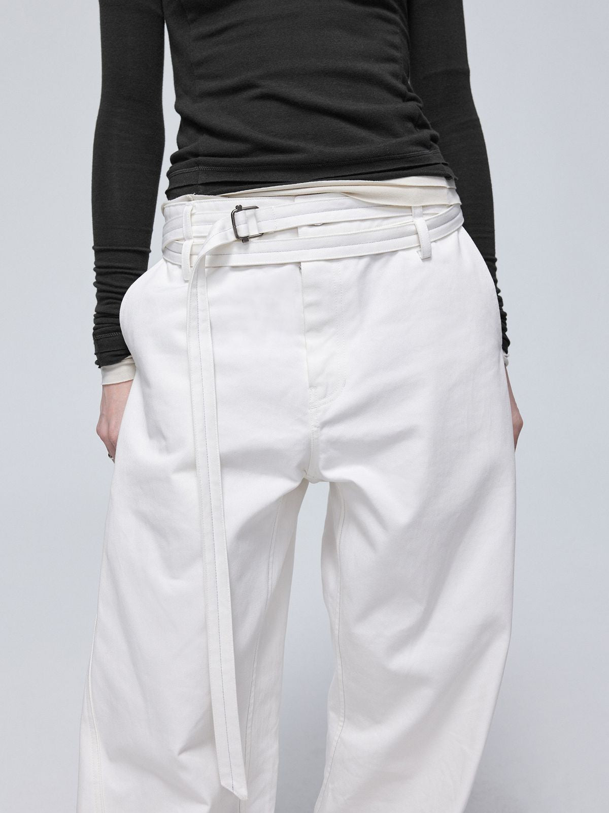 Simple Project Twisted Belt Curved Leg Pants in White - On Female Model