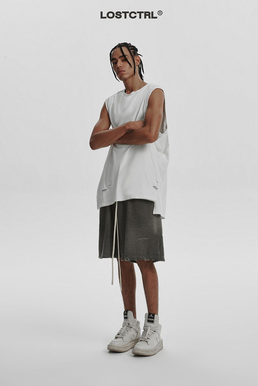 LOSTCTRL Washed Distressed Cotton Shorts in Gray - On Model