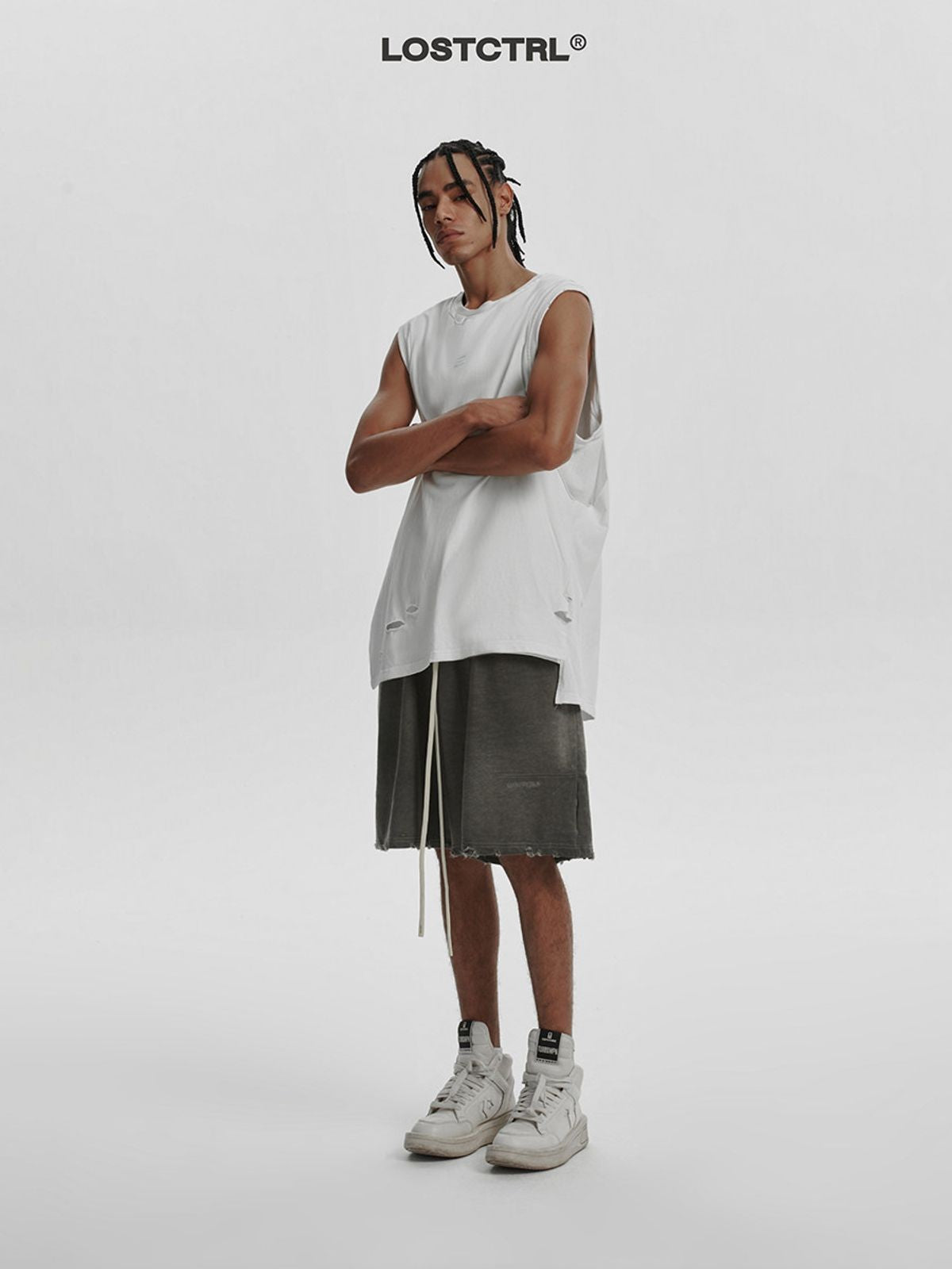 LOSTCTRL Washed Distressed Cotton Shorts in Gray - On Model