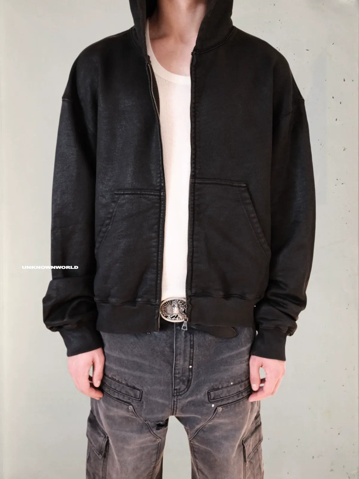 UNKNOWNWORLD Hand Waxed Cotton Zip Up Hoodie in Black - On Model