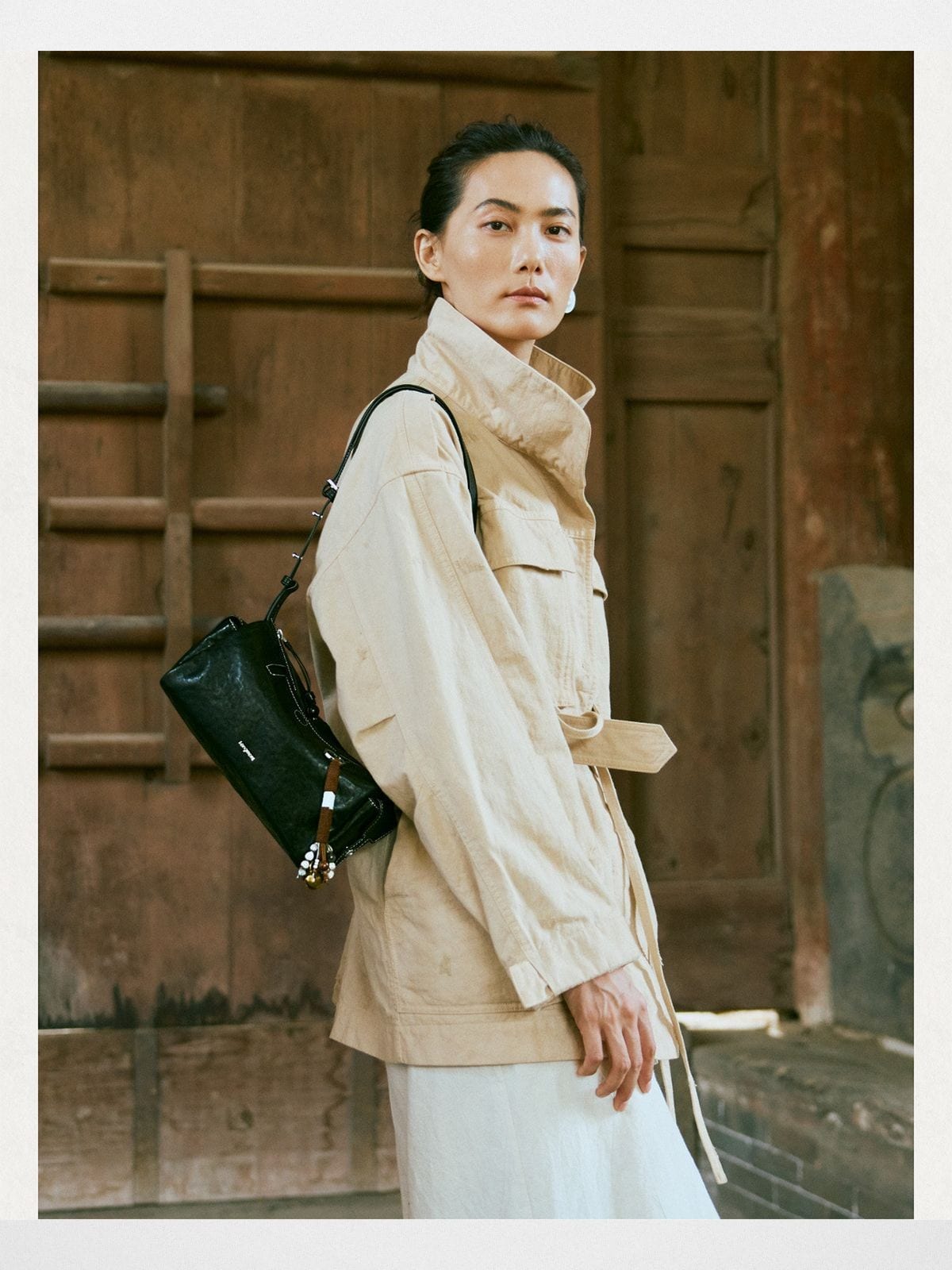 Songmont Mini Leather Camera Bag in Black - On Model