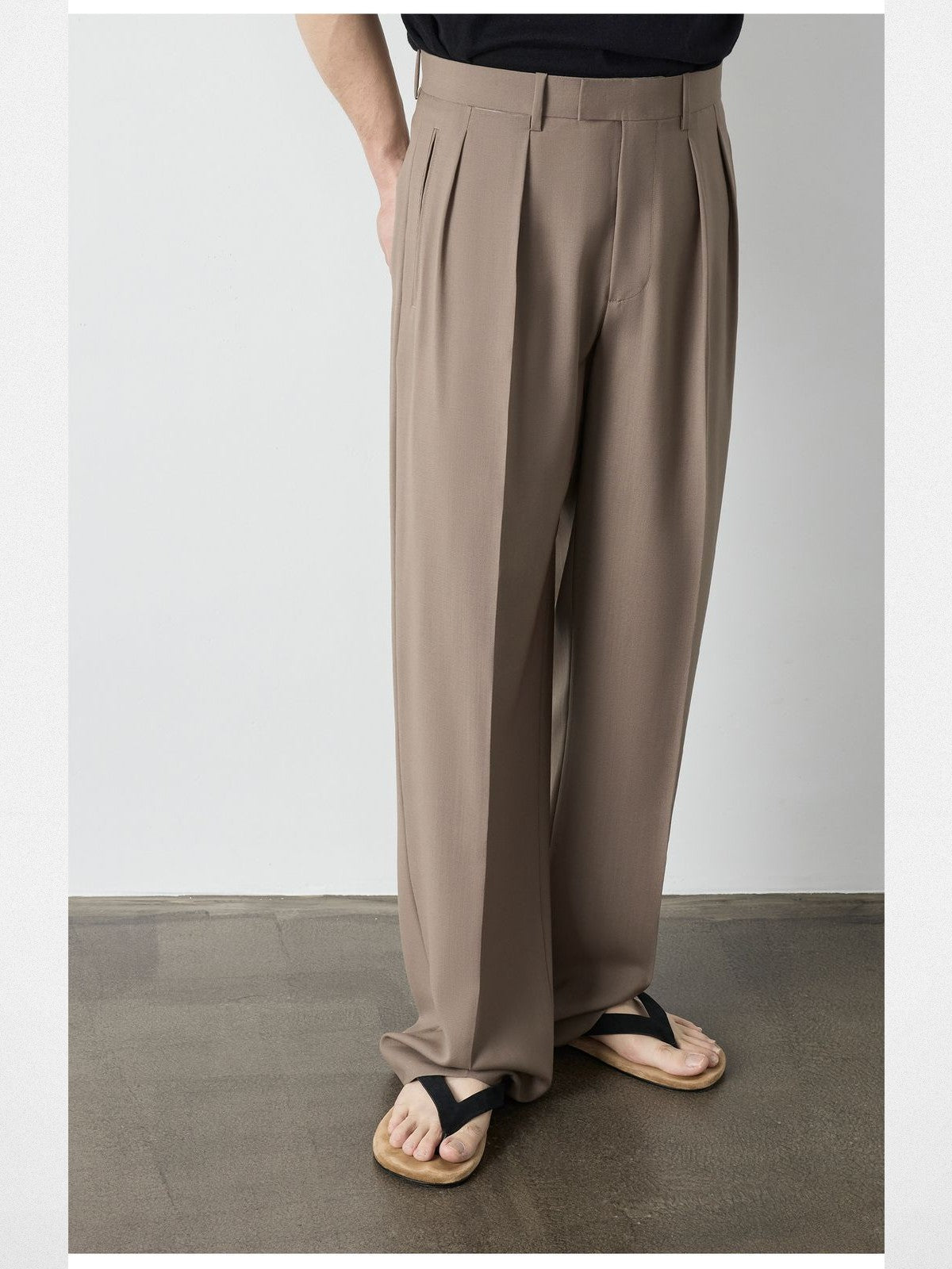Roolrren Homme Pleated Wool Trousers in Beige - On Model